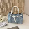 Bolso de diseño único para mujer, nuevo y elegante bolso tipo cubo plisado de verano 2026, bolso de hombro y cruzado para el trabajo