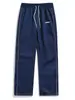 Calça masculina nova de tecido tamanho europeu Marca de moda de rua europeia e americana calça casual retro para os dedos geração transfronteiriça masculina