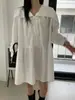 Chic coreano Colección de otoño nueva estilo coreano: un vestido único de cuello azul marino, con cierre de corbata al frente, mangas abullonadas y corte holgado que disimula imperfecciones y te hace lucir más joven