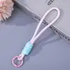 Cordão de celular com nó de guarda-chuva de dopamina, chaveiro de boneca simples criativo para mochila, pingente acessório de corda trançada colorida