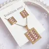Nuevo especial transfronterizo explosión de tendencia europea y americana titanio acero alta calidad color collar pendientes traje femenino joyería de concha real