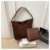 Bolso de mujer de gran capacidad, otoño e invierno vintage 2026 nuevo, de un solo hombro cruzado esmerilado, bolso madre-hija, popular bolso cubo este año