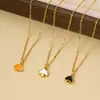 Nuevo Collar de Esmalte Negro en Forma de Corazón Moda Europea y Americana Aretes de Esmalte con Forma de Corazón Lujo Ligero Tendencia Collares y Aretes para el Día a Día