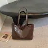 2026 Nuevo Estilo Coreano Moda Nicho Retro Bolso Tote Gran Capacidad Versátil para Viajes al Trabajo Bolso de Hombro Cruzado