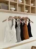 Camisola dulce de lunares estilo francés para mujer con sujetador incorporado, ribete de volantes, corte ajustado, top que ciñe la cintura, venta al por mayor para capas