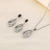 Diseño de pendientes de acero inoxidable con forma de gota de aceite negra, bucle irregular estilo Hong Kong, pendiente de viento frío de acero de titanio