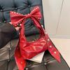 Estilo americano Hot Girl Sweet Cool Style Bow Design Bolsa de ombro com axila Outono e inverno Nova bolsa de mão estilo máquina de rebite