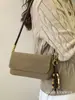 2025 Novo Design de Nicho Tendência Bolsa de Ombro Único de Alta Qualidade para Mulheres Outono e Inverno Versátil Baguete de Mão Transversal