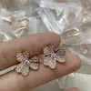 V Ouro Versão Alta Esculpido com Precisão CNC Colar Pulseira Trevo de Quatro Folhas Full Diamond Superfície Espelhada Pétala Banhado a Ouro 18K Ouro Rosa Versátil