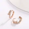 Aretes de tachuela de oro rosa de nicho de lujo ligero transfronterizos, exquisitos, modernos, versátiles, personalizados, adecuados para ir al trabajo, aretes simples y sofisticados