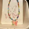 Nuevo Versátil de Perlas Colorido Dopamina Juguetón Contraste Dulce Verano Fresco Mariposa Collar Cadena de Clavícula Gargantilla