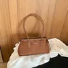 Bolso para el hombro Melanoid Commute para mujer 2026 Nuevo estilo Tendencia Otoño Retro Sensación de alta gama Lujo ligero Nicho Bolso de hombro