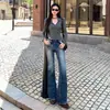 Jeans acampanados de cintura baja estilo chica picante americana para mujer, nuevos pantalones bootcut de pierna ancha elásticos adelgazantes de cintura alta, primavera 2026