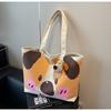 Bolsa de Lona Transfronteiriça para Mulheres, Grande Capacidade, Nova Versátil Bolsa de Ombro Primavera e Verão 2026, Bolsa Tote Casual com Desenho Animado para Estudantes