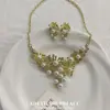2026 Novo Estilo Vintage Strass Pérola de Imitação Colar e Brincos Personalizados Conjunto de Duas Peças Joias de Moda Versáteis Atacado