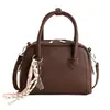 Bolso de mujer de estilo coreano, de nicho, con forma de concha, inspirado en el bowling, casual, versátil, se puede llevar en la mano, al hombro o cruzado, simple, elegante, moderno, bolso pequeño cuadrado