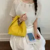 Bolsos de Moda de Este Año 2026 Nuevo Diseño de Nicho Único Bolso Plegado para Mujer Verano Casual Color Sólido Bolso de Mano Versátil