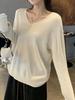 Suéter de lana con cuello en V para mujer, otoño e invierno, nueva moda, estilo extranjero, suéter de base de punto blanco de alta gama con borde cruzado