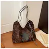 Bolso de mano transfronterizo estilo coreano con estampado de leopardo para mujer, bolso de hombro tipo almohada de color sólido, estilo de lujo ligero y exquisito, bolso cruzado versátil