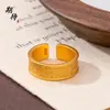 Mesmo estilo do anel aberto com padrão Taotie de loja de ouro para mulheres, novo estilo chinês, retrô, estilo nacional, aro largo, anel de casal atacado