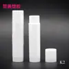 Suministro de fábrica tubos de lipstick blancos para cosméticos, tubos vacíos para bálsamo labial, tubo redondo de plástico K2 para cera