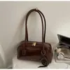 Bolsa Feminina Simples e Versátil 2025 Nova Moda Inverno Bolsa de Ombro para Sobrancelha com Toque de Luxo para o Dia a Dia Bolsa Boston