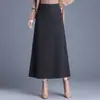 Elegante y minimalista falda midi de lana línea A, nueva colección otoño/invierno 2026, de cintura alta, estiliza y cubre la cadera, adecuada para ropa de trabajo