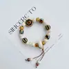Pulsera de Cerámica Jingdezhen Nueva Historieta China Pulsera Boutique Venta al por Mayor Estudiante Joker Explosiones Puesto del Mercado Nocturno Pulsera