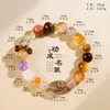 Pulsera de Cristal Súper Siete Tesoros Múltiples Negro Dorado Natural con Cuentas para Niñas Lujo Ligero Alta Gama Pulsera de Cristal Torre Amarilla Estilo Popular Venta al por Mayor