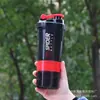 Taza agitadora de plástico multifuncional de tres capas para gimnasio, taza mezcladora de batidos de proteína, vaso de agua para deportes al aire libre en stock