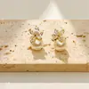 Pendientes de botón de flor y perla versátiles de moda Diseño de nicho Estilo de lujo ligero Pendientes de moda
