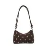Bolsa Pequeña Cuadrada Fresca Dulce al por Mayor para Mujer 2026 Otoño Nuevo Bolso de Hombro Único de Lunares Marrones Bolso de Axila para el Trabajo