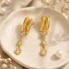 Pendientes de Acero de Titanio Transfronterizos Yuhui con Forma Geométrica e Incrustaciones de Diamantes, Estilo Milenio, Chapados en Oro Real de 18 Quilates, Pendientes de Acero Inoxidable Impermeables