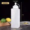 Botella exprimible de gran calibre, estilo japonés, con tapa y boca puntiaguda, ideal para cocinar, para salsa de miel y ketchup.