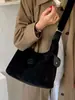 Bolsa Grande de Cor Lisa Personalizada 2026 Novo Estilo Outono Inicial Moda Ombro Único Sobrancelha Bolsa Tote Relaxada para o Dia a Dia