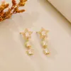 Pendientes de plata de ley 925 para mujer, estilo dulce y fresco de nicho coreano y japonés, pequeños pendientes de botón de estrella de cinco puntas con borla, simples y de moda