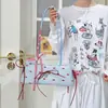 Bolsos de Color Contrastante Nicho para Mujer 2025 Nueva Moda Versátil Bolso Cruzado Dulce Cool Sexy Portátil Bolso Balde