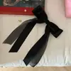 Horquilla para el pelo con lazo negro, tamaño pequeño, para mujer, estilo princesa, con flequillo alto