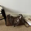 Bolsa de Bolinho Tendência Estilo Coreano Nicho Versátil para o Dia a Dia Bolsa de Ombro Único Feminina Grande Capacidade Nova Moda 2026 Bolsa Transversal