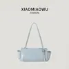 Bolsa de mão transfronteiriça novo estilo, design de nicho, cor sólida simples, bolsa de ombro versátil estilo coreano para estudantes mulheres, adequada para o trajeto