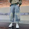 Roupas Infantis Calças Jeans para Meninos Primavera e Outono 2026 Novas Calças Compridas de Primavera Calças Casuais para Meninos para Crianças Mais Velhas Tendência de Moda da Primavera