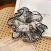 Elástico de cabelo com laço elegante para rabo de cavalo baixo, acessório de cabelo para prender e estilizar o cabelo, faixa de cabelo com estampa de leopardo, novo estilo 2026, corda de cabelo estilo casual