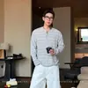 Suéter de punto con cuello Henley, jersey de manga larga a rayas hueco para hombre, estilo fino de otoño e invierno, venta al por mayor de fábrica transfronteriza