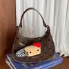2026 Nova Bolsa de Axila Retro de Bolinhas para Outono Bolsa de Ombro Único Transversal Fofa Bolsa de Mão de Menina Doce