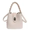 Bolso tipo cubo de diseño nicho nuevo de primavera, moderno, casual, único, bandolera cruzada de hombro de moda para mujer 2026