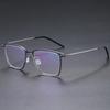 Gafas de titanio puro para hombre y mujer, montura para miopía, estrella, gafas transfronterizas al por mayor, gafas con diseño sin tornillos 6554