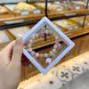 Libro Caperucita Roja Mismo Estilo Estudiante Pulsera de Glaseado de Palomitas de Maíz Hecha a Mano con Cuentas Dibujos Animados Cristal Pulsera Infantil Venta al por Mayor Cajas de Regalo