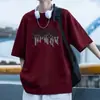 Camiseta preta de algodão puro com estampa de letras estilo americano, modelagem solta, manga curta, modelo novo 2026, moda masculina