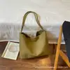 2026 Nuevo Bolso Tote Tejido Simple Elegante Estilo Coreano Personalidad de Viaje Bolso de Axila Alta Apariencia Única Bolso de Hombro Único