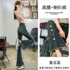Pantalones de campana pequeños de mezclilla micro azul retro para mujer, Otoño e Invierno 2024, Nuevo diseño de cintura alta adelgazante, Sentido del diseño